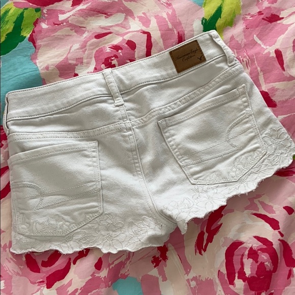 American Eagle white denim shorts w/ floral decal - Picture 3 of 3
